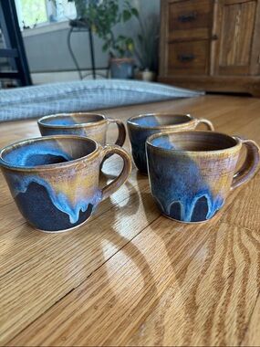 Four ceramic mugs